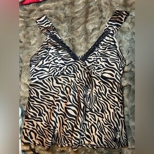 Animal print dress shirt. 
Pair with a sweater or jacket….very pretty!